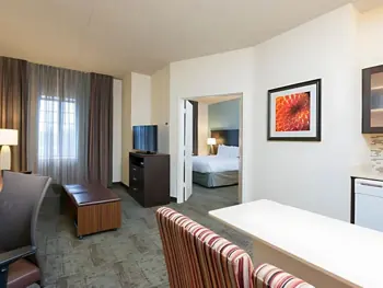 Living area of Oakbrook Terrace 1 Queen 2 Double 2 Bedroom Suite